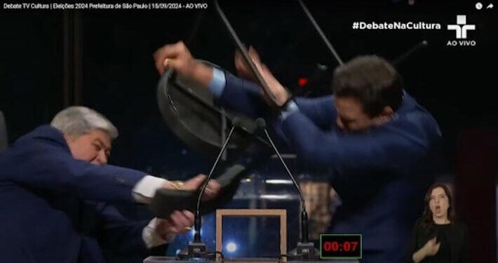 Datena dá cadeirada em Marçal durante debate